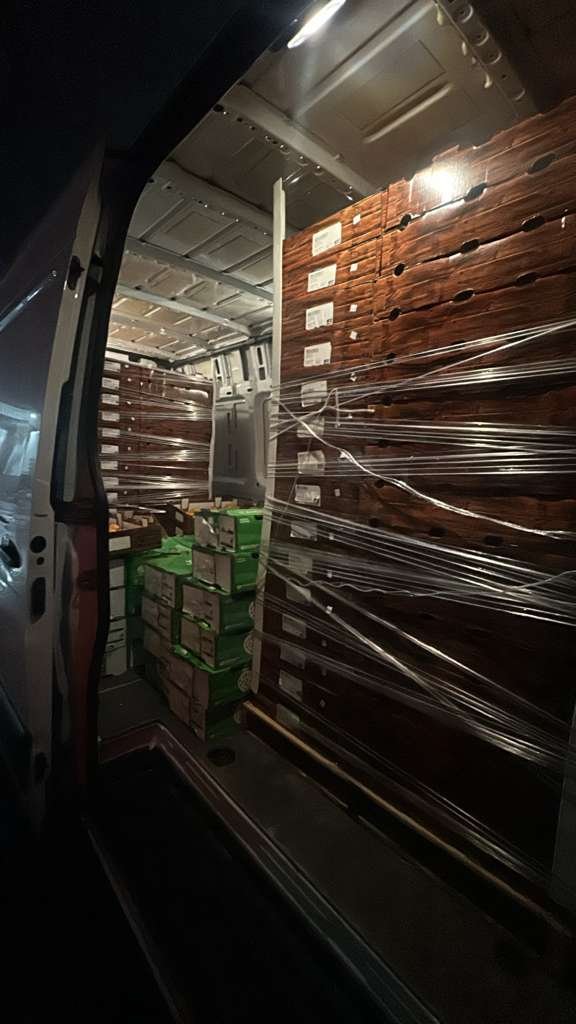 Wine crates loaded in Santini delivery van